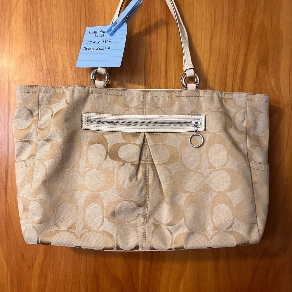 Larger Coach tote- has blemishes pictured on handles. Make up stain on the insid